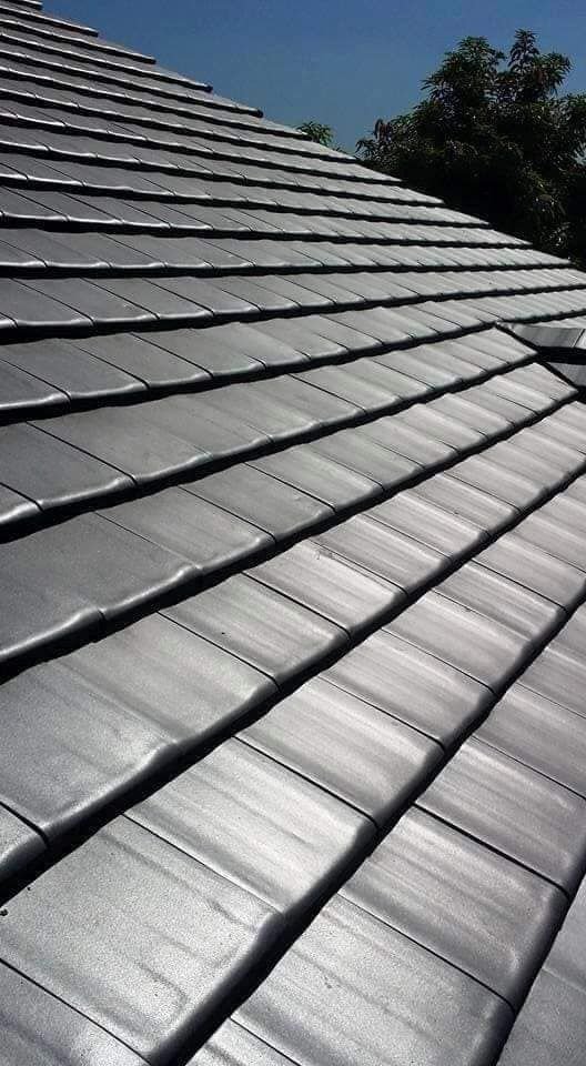 Concrete roof tile installation on a residential home