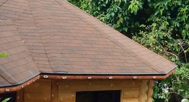 Asphalt shingle roof on a wooden gazebo structure